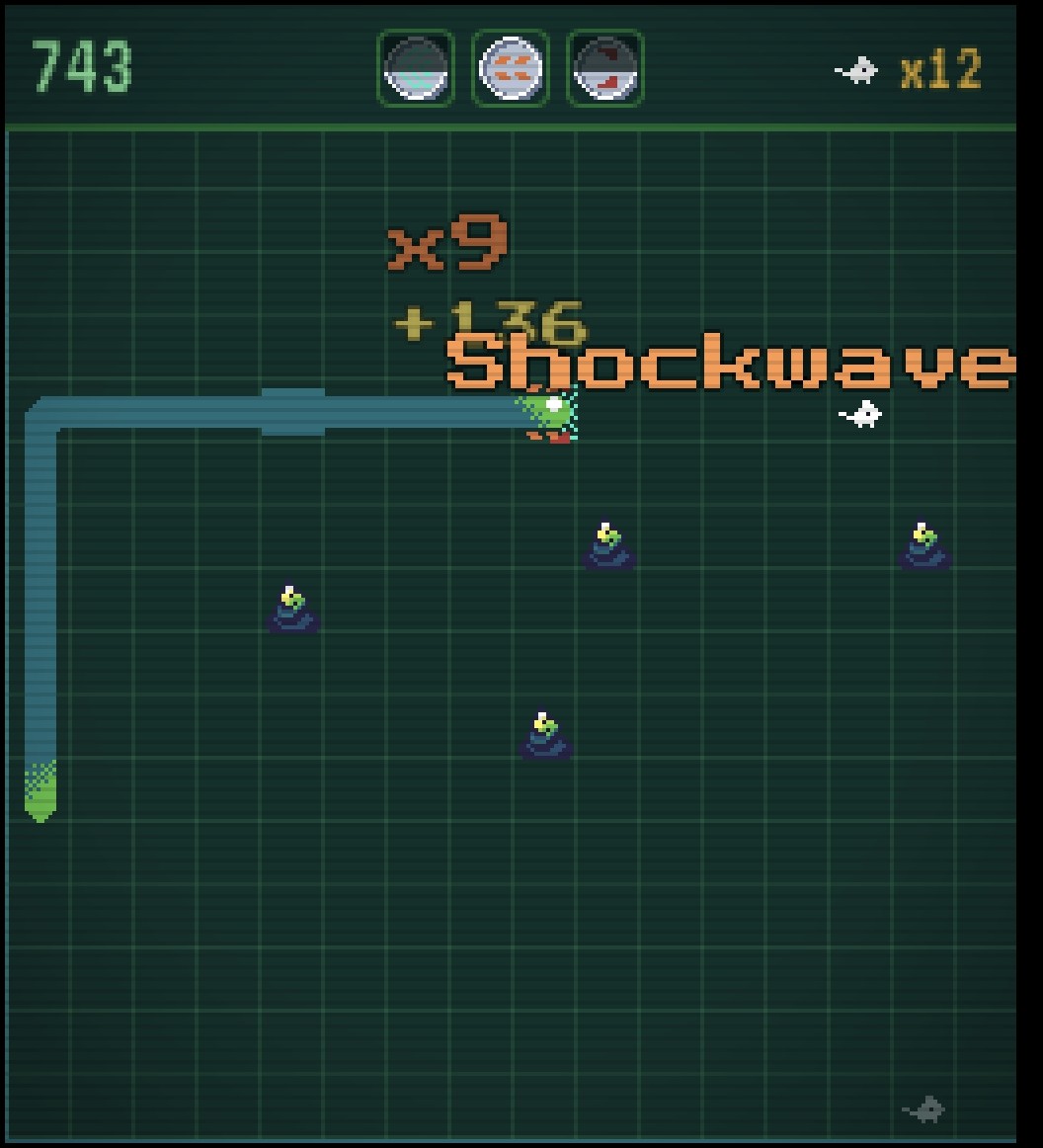 Paused in-game screen showing the score, a snake segment, and a poop obstacle left behind on the board